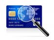 Vector credit card with magnifying glass