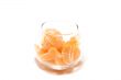Tangerine segments in a glass bowl