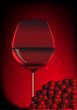 goblet red blame and branch of grape