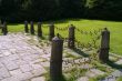 Metal fence with stone columns
