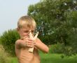Child with a slingshot.