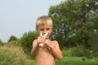 Boy with a slingshot.