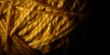 Macro shot of a ball of string texture isolated on black