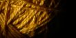 Macro shot of a ball of string texture isolated on black