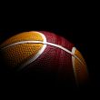 Close-up of a basketball isolated on black background