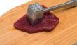 Cooking meat.