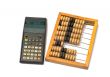 Calculator and wooden abacus.