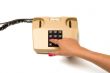 Hand and telephone.