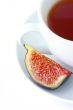 Tea cup and fig fruit 