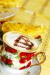 Cappuchino, with chocolate heart and cake 