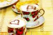 Cappuchino, with chocolate heart and cake