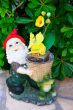 Gnome with yellow flowers