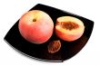 red peaches with pip on black dish