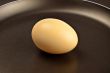 brown egg on frying pan