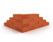 Corner of wall made from orange bricks