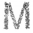 Alphabet made from hammered nails, letter M