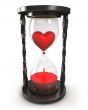 Hourglass with heart and blood