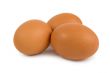 Three brown eggs isolated