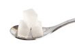Spoon with sugar cubes