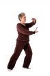 Senior woman doing Tai Chi Yoga exercise