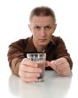 Man and glass with water.