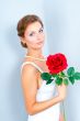 The bride with a red rose