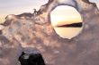 Sunset through ice`s holes in Finland