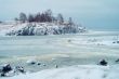 Frozen sea blue landscape with mountain in Finland