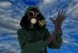 Gas mask, gloves, the person