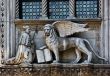 The Venetian lion and Doge on a cathedral building on San Marco 