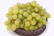 Green grapes in basket.