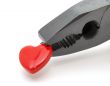Heart in black pliers