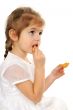 The girl eats cookies