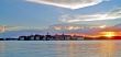 Sunset, lake and buildings