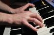 Man playing synthesizer
