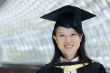 Smiling asian chinese lady graduate 