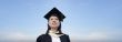 Asian lady graduate look up with panoramic sky