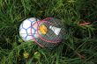Badminton Rackets and Bird on the Ball