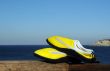 Beachshoes Against the Sea Background