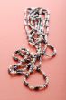 costume jewel beads on red close up