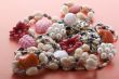 costume jewel on red closeup