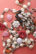 costume jewel on red close up