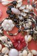 costume jewel on red macro