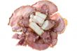 Cutting smoked sausage and pork gammon 