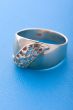 Gold ring on blue