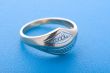 Gold ring on blue background