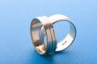 Gold rings on blue background macro