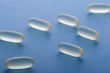 Medical pill on blue