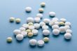 Medical tablet on blue