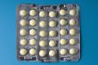 Medical tablet on blue macro